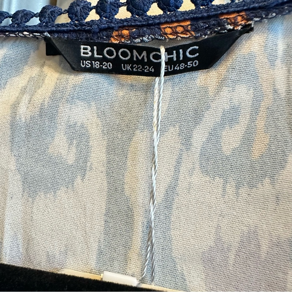 BloomChic Navy, White & Purple Ikat Peplum Blouse with Orange Accents - Picture 2 of 5